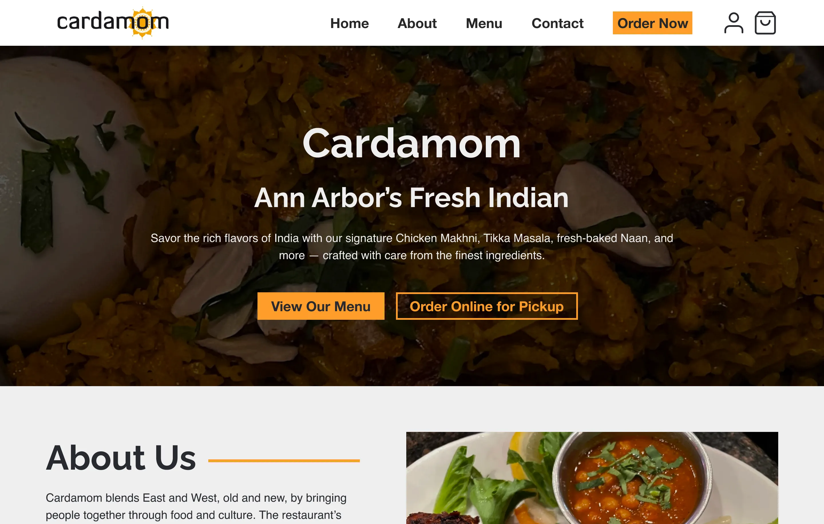Final homepage on desktop: the Cardamom logo and menu with an orange Order Now button above a dark biryani photo with “Cardamom, Ann Arbor’s Fresh Indian”, View Our Menu and Order Online for Pickup buttons, then an About Us section.